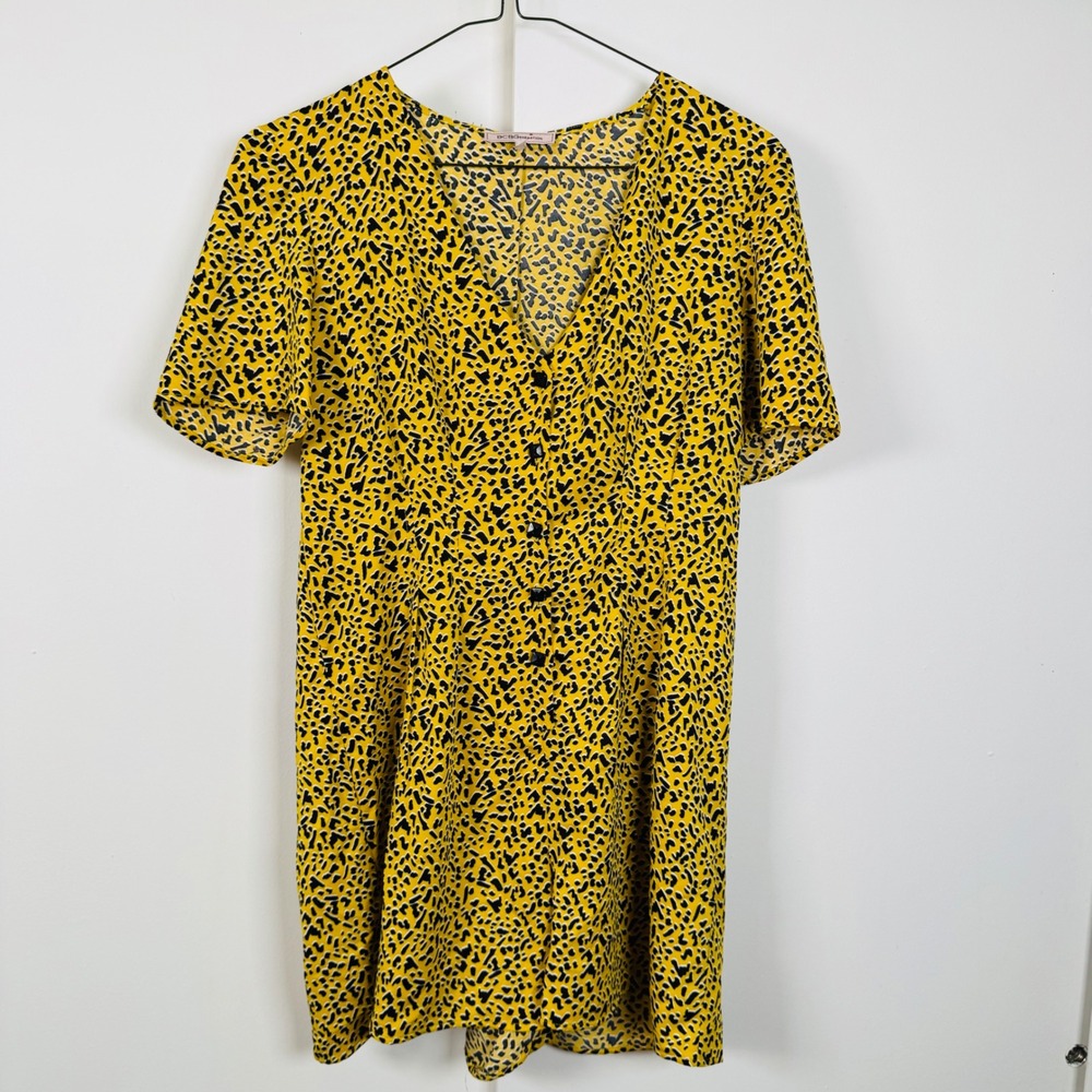 BCBGeneration Yellow Black Animal Print Romper V-Neck Button Front Artsy M SS